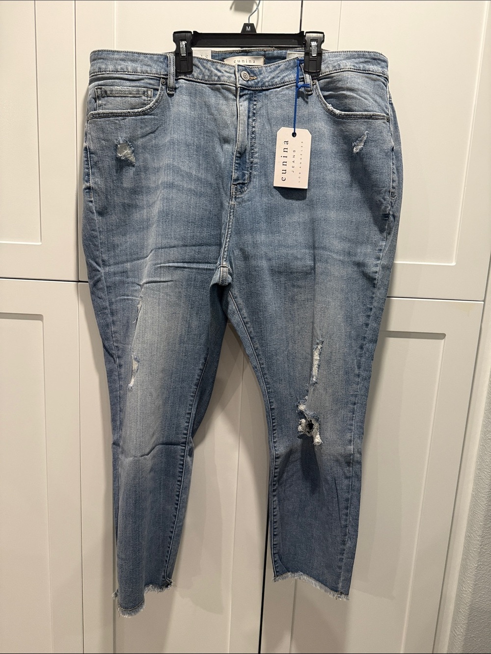 Cupio Light Wash Distressed Ankle Jeans